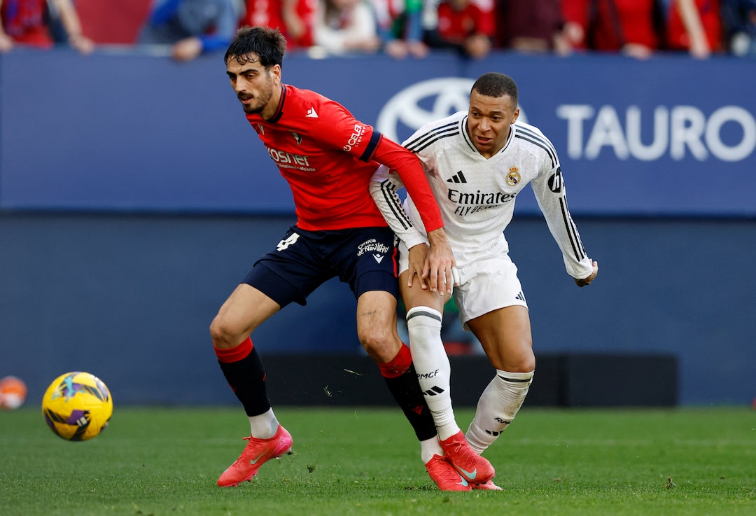 Ten-man Real Madrid held by Osasuna after Bellingham sees red | Reuters